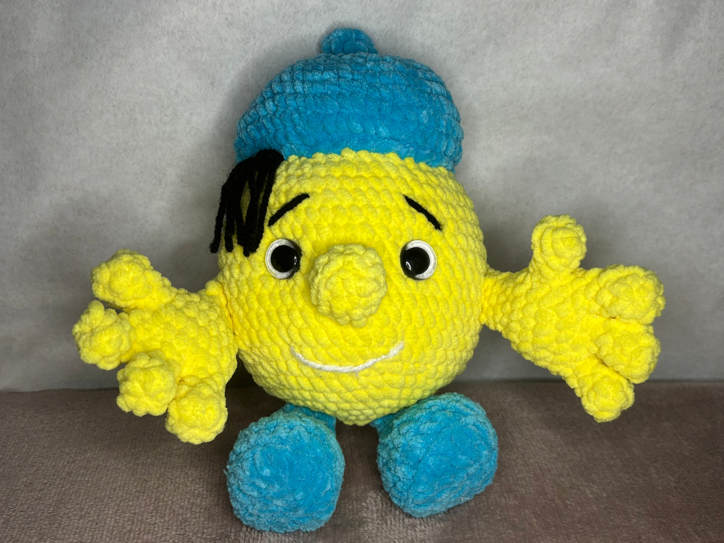 Kolobok soft knitted toy