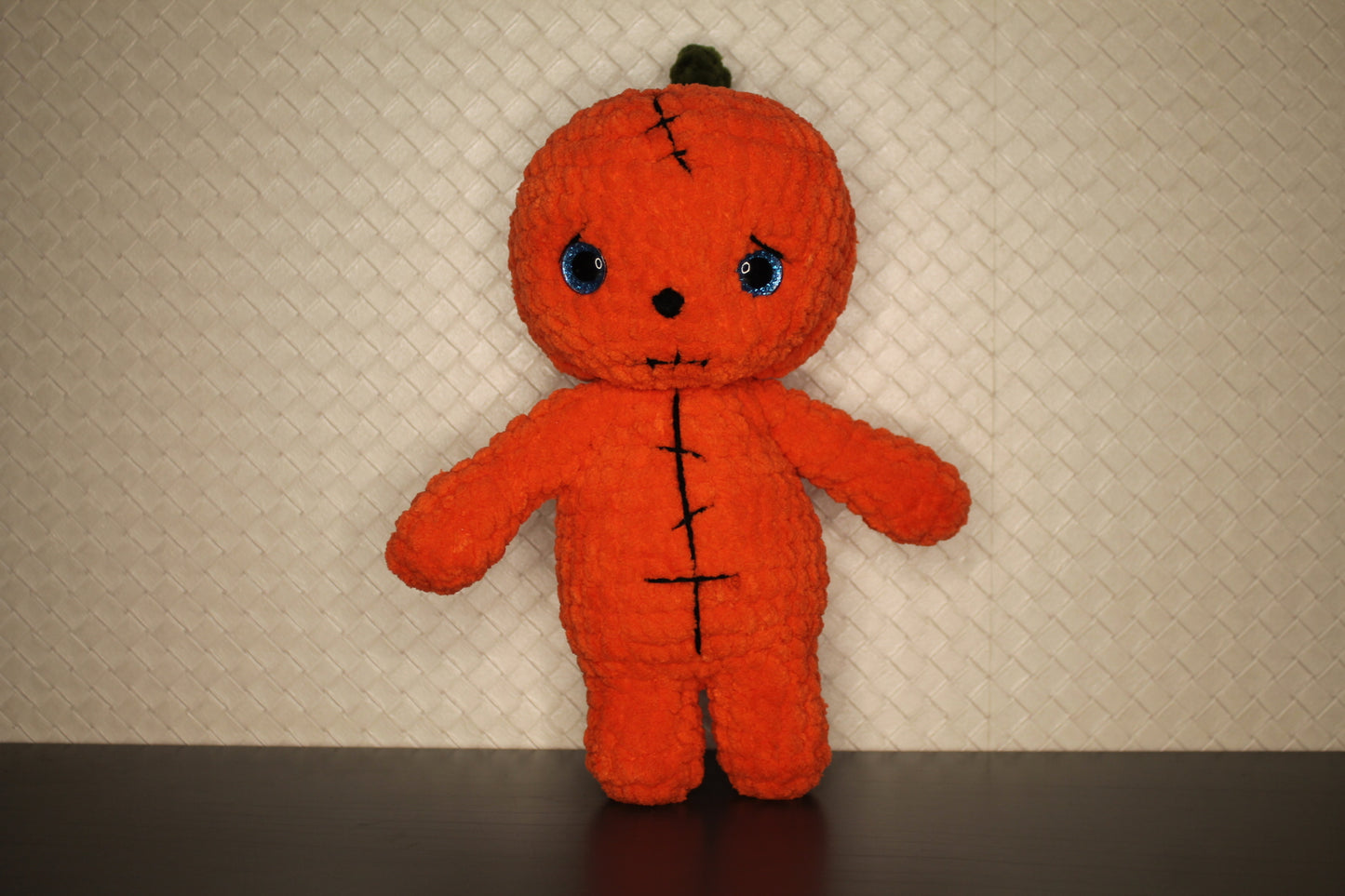 Pumpkinhead knitted soft toy