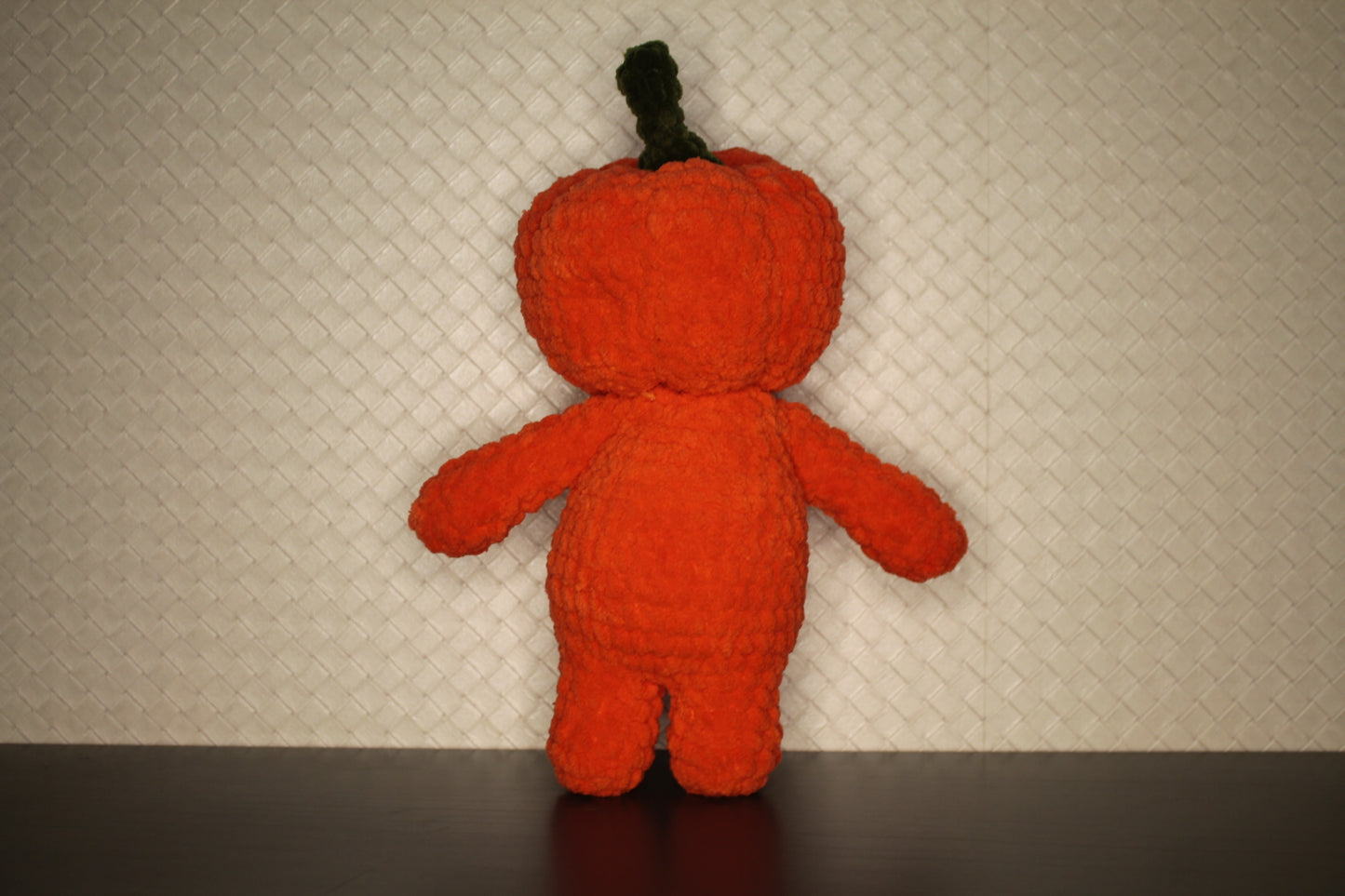 Pumpkinhead knitted soft toy