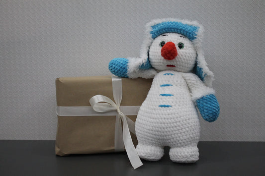 Snowman knitted soft toy